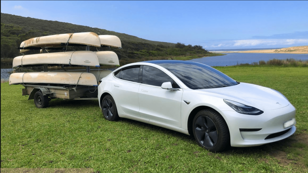 Can You Tow a Tesla Behind an RV